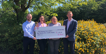 One Broker Ambulance celebrates fundraising total for TASC